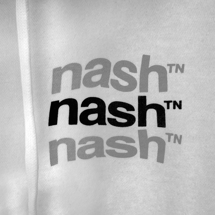 A close up photo of the front design that reads nashᵀᴺ three times in alternating colors gray, black and gray wavy shaped text.