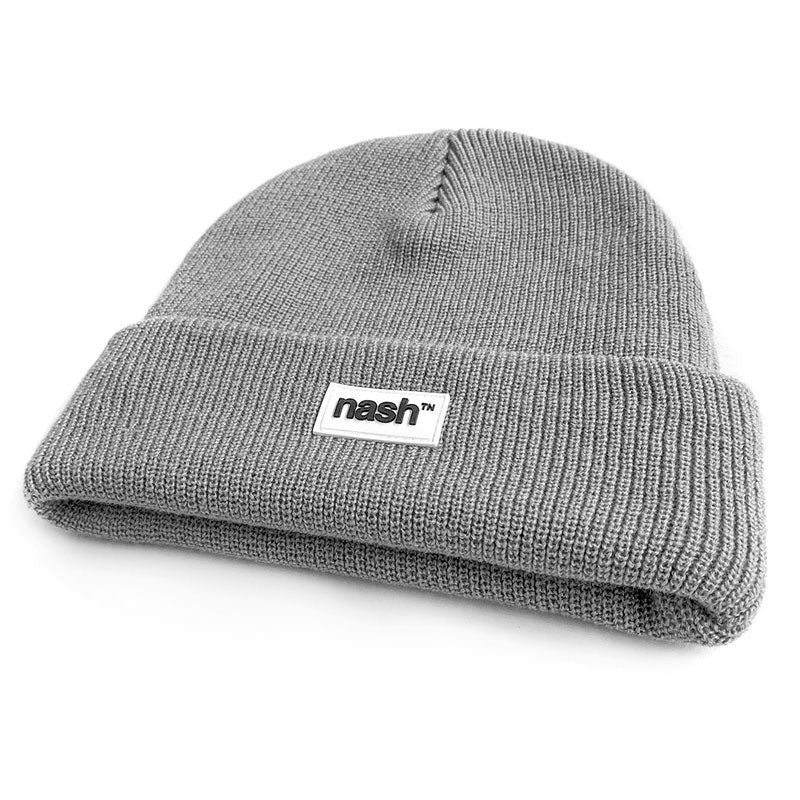 Angled view showing texture and thickness.  Gray beanie on white background. Small, white rectangle with black nashᵀᴺ  logo on front center of cuff.
