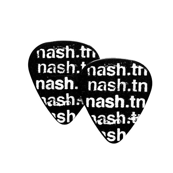 Two back guitar picks shown on a white background. The text, nash.tn, is repeated  in white. The text looks spray painted graffiti tag art.