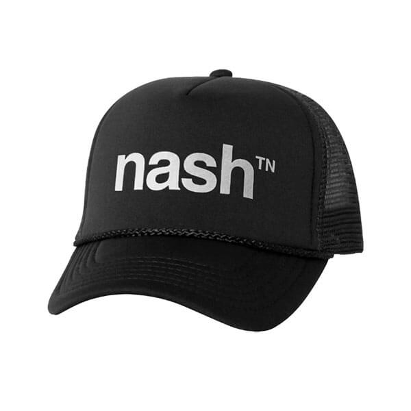 Black baseball cap with white letters on white background. Cap visor is slightly curved and there is a rope detail where visor meets front of hat. The logo nashᵀᴺ  is printed in white ink on the front of the hat.